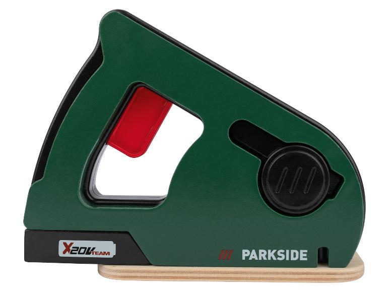Groene en zwarte speelgoed decoupeerzaag met rode handgreep en Parkside-logo.