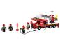 Bouwset met brandweerwagen en brandweerfiguren.
