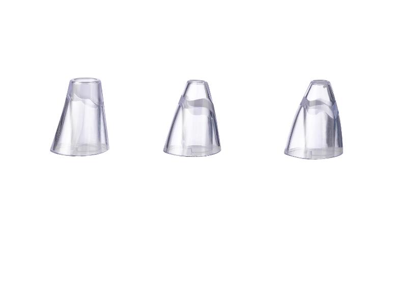 Drie transparante opzetstukken voor een gezichtsreinigingsapparaat.