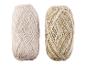 Twee bollen garen, één beige en één meerkleurig in beige en bruin, beide met zilvergarn.