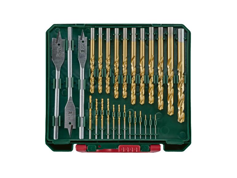 Gouden boren en zilveren vlinderboren in een groene koffer.