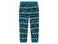 Een paar blauwe kerst pyjamabroeken met rendieren, kerstmannen en gingerbread mannetjes.