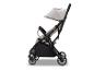 Lichte en compacte beige kinderwagen met zwart frame