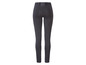 Donkergrijze leggings met elastiek in de taille.