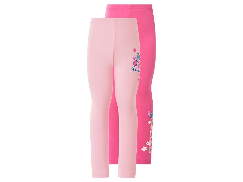 Twee roze en fuchsia kinderleggings met cartoonprint.