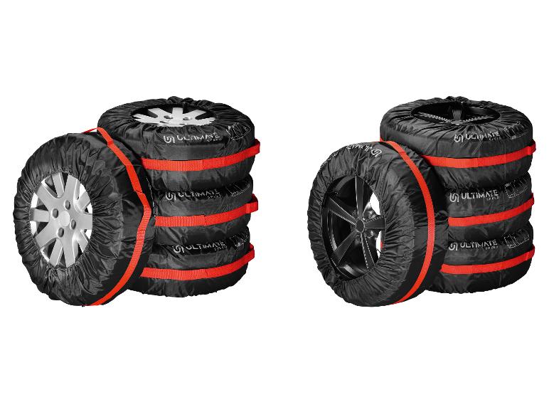 Twee stapels banden met zwarte hoezen en rode banden, met het Ultimate Speed-logo.