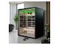 Moderne infraroodsauna in een badkamer, met groene verlichting en houten interieur.