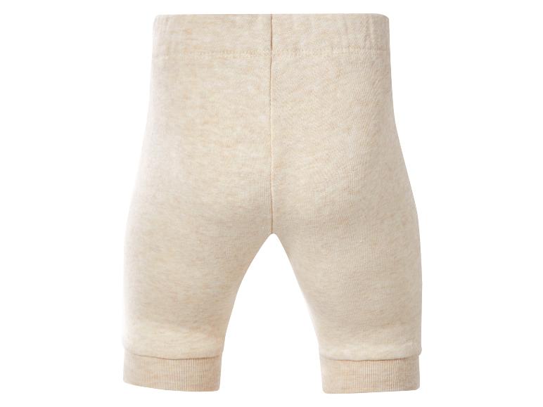 Beige babybroek met elastische tailleband en boorden