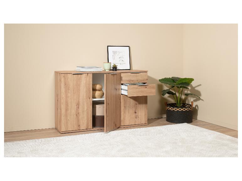 Modern houten meubilair in een lichte tint met een open lade.