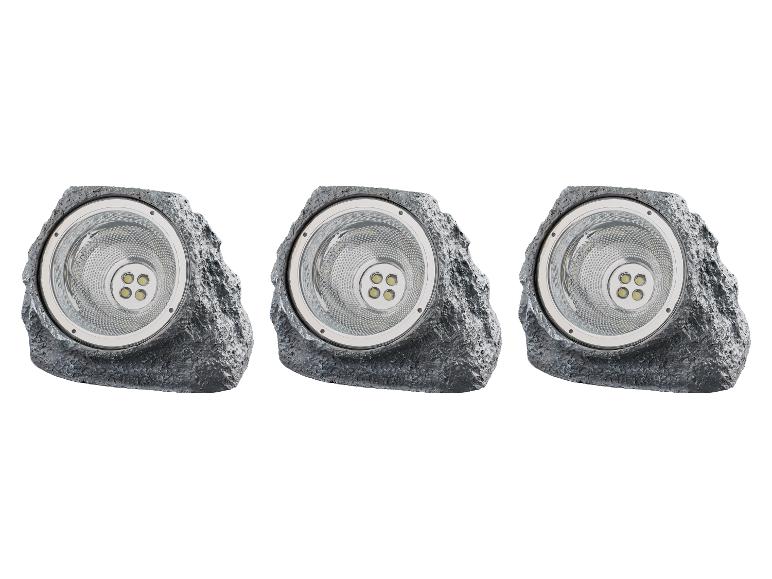 Drie grijze rotsvormige LED solarlampen.