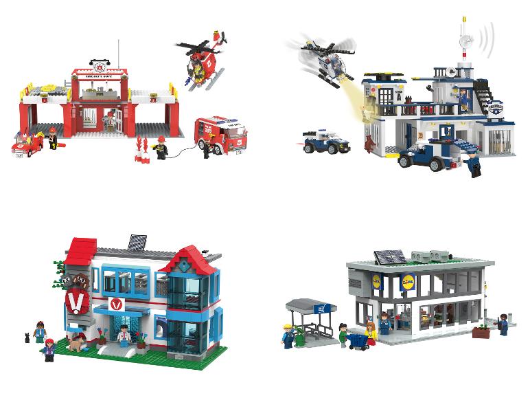 Lego-achtige sets met brandweerkazerne, politiebureau, dierenkliniek en Lidl-supermarkt.