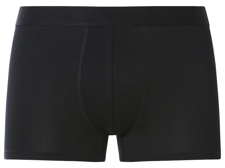 Zwarte herenboxershort met elastische tailleband en zichtbare stiksels.