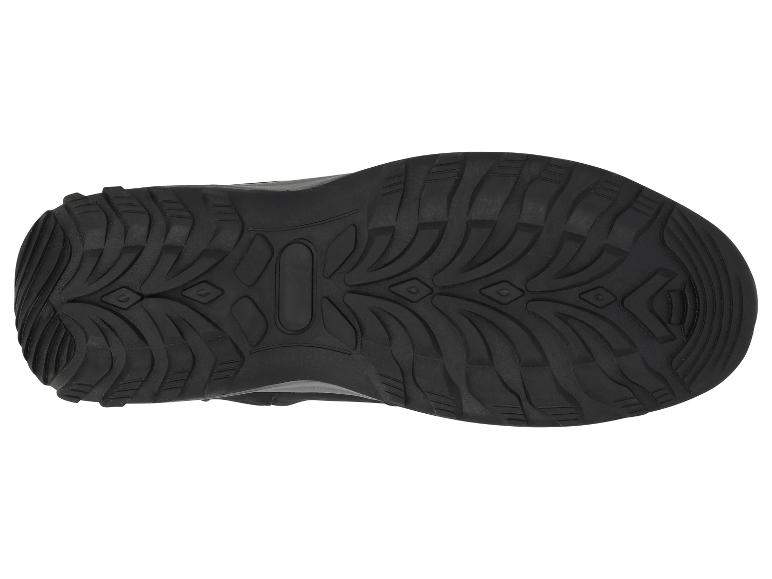 Zool van een zwarte wandelschoen met een robuust profiel.