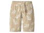 Beige mousseline shorts met witte bladprint en trekkoord.