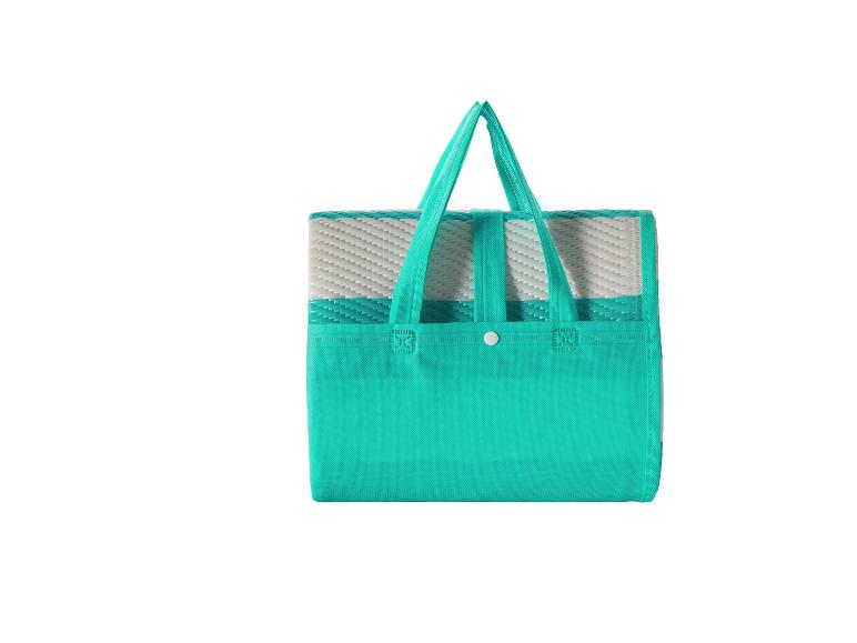 Opvouwbare turquoise en witte picknickmat met handvatten