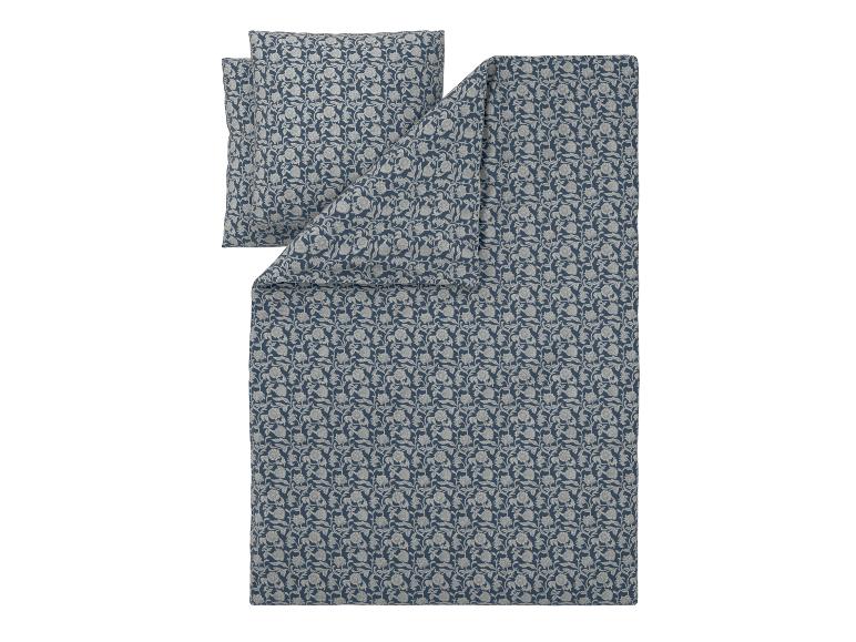 Dekbedovertrek en kussenslopen set met blauw en grijs bloemenpatroon.