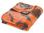 Oranje-grijze deken met Halloween pompoenmotieven.