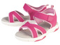 Twee roze sandalen met witte zool.