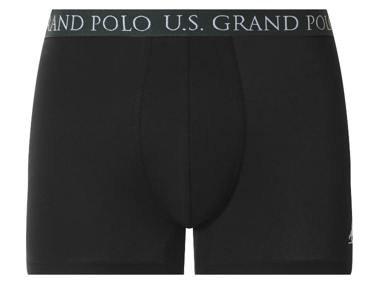 Zwarte boxershorts met groene tailleband en witte tekst 'U.S. GRAND POLO'.