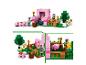 LEGO Minecraft set met een roze varkenshuis, personages en dieren.