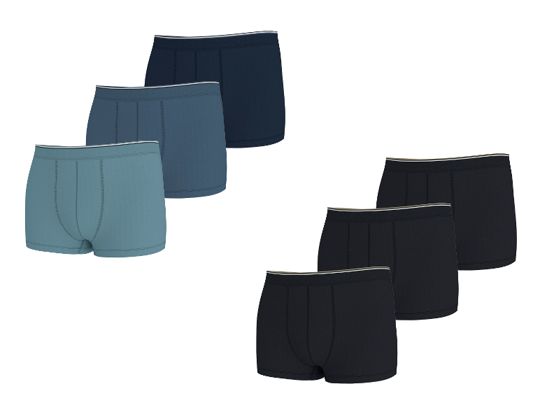 Zes herenboxershorts in drie verschillende kleuren: lichtblauw, donkerblauw en zwart.