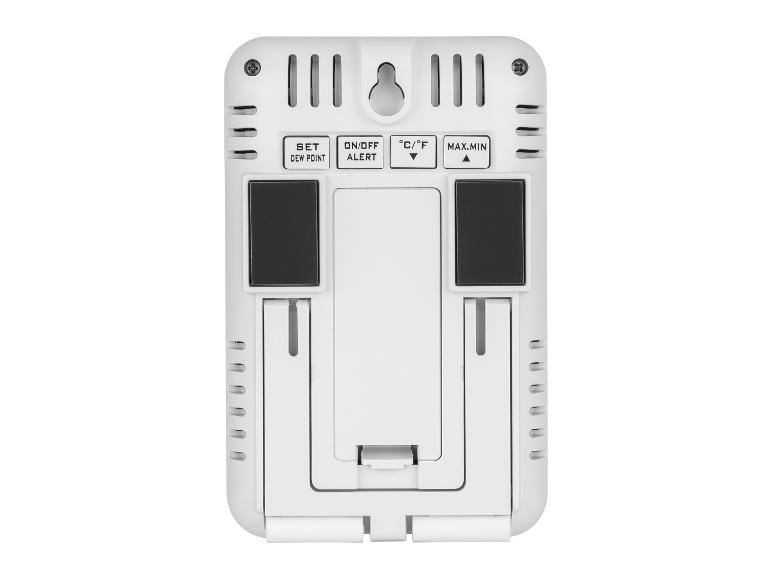 Achterkant van een witte digitale thermometer met knoppen en standaard