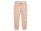 Beige joggingbroek met bloemenprint.
