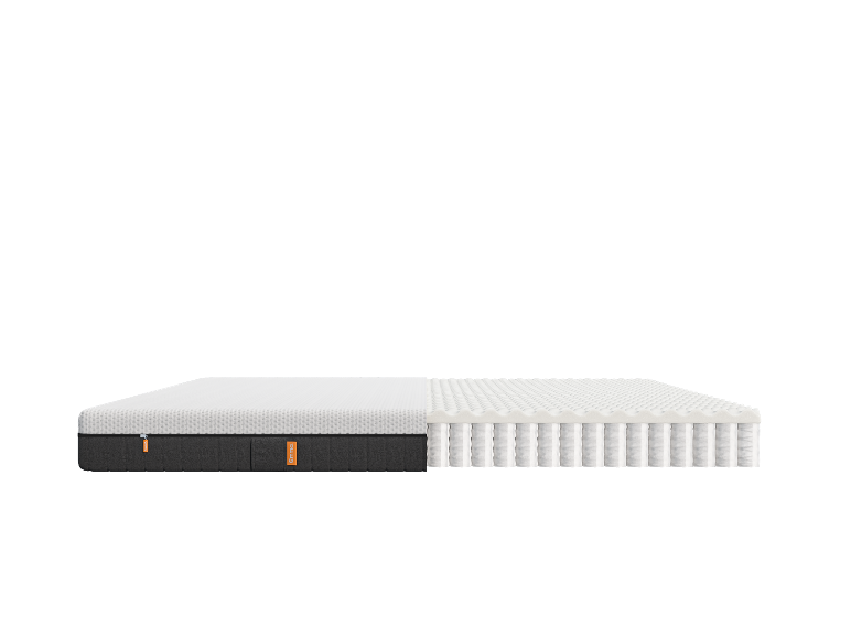 Doorsnede van een Emma matras: Bovenste schuimlaag en binnenkern.