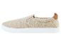 Beige canvas slip-on sneakers.