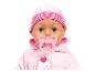 Babypop met roze muts en speen