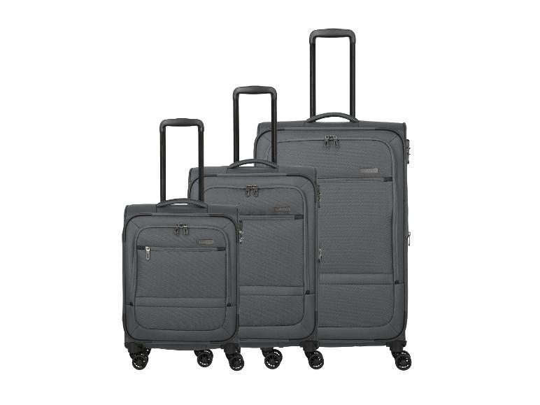 Set van drie grijze reiskoffers in verschillende maten.