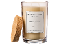 Geurkaars in glazen pot met kurken deksel, gelabeld 'Sublime Patchouli'.