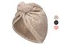 Beige tulbandhanddoek voor haar met een decoratieve knoop aan de voorkant