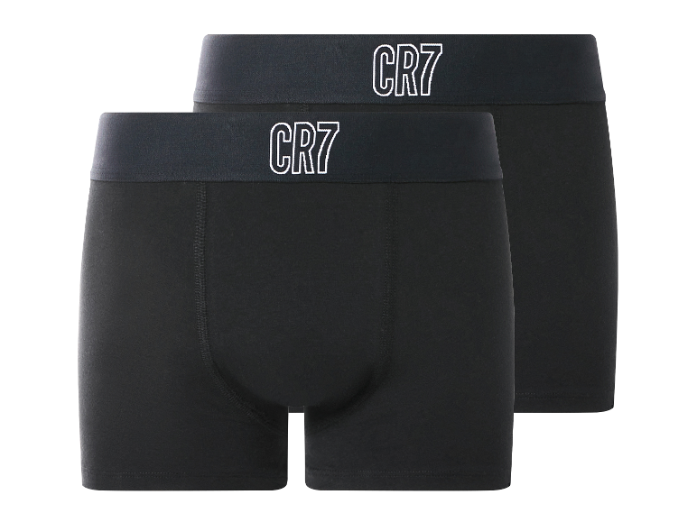 Twee zwarte boxershorts met donkere elastische taillebanden en witte 'CR7'-logo's.