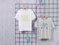 Twee T-shirts met zomerse prints: 'Fresh Summer' en 'Stay Cool'.