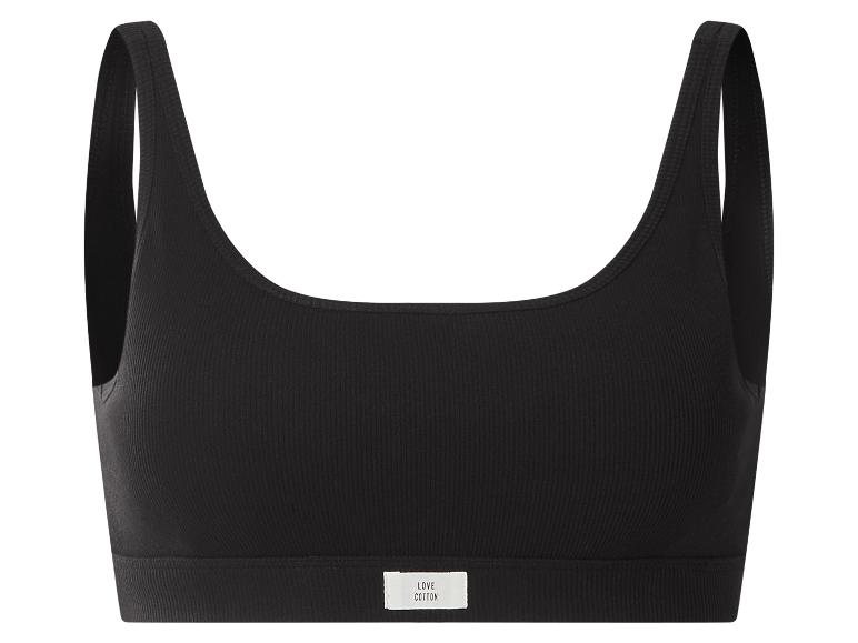 Zwarte geribbelde katoenen sporttop met brede bandjes en een wit etiket.