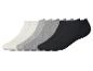 Set van zes paar sportsokken in wit, grijs en zwart.