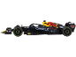 Zwart-gele speelgoedraceauto met sponsorstickers.
