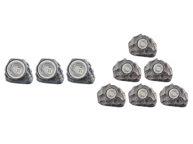 Zes tuinlampen in rotsvorm met LED-lampen.