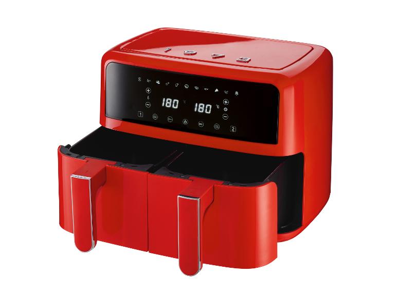 Rode heteluchtfriteuse met dubbele mand en digitaal display.