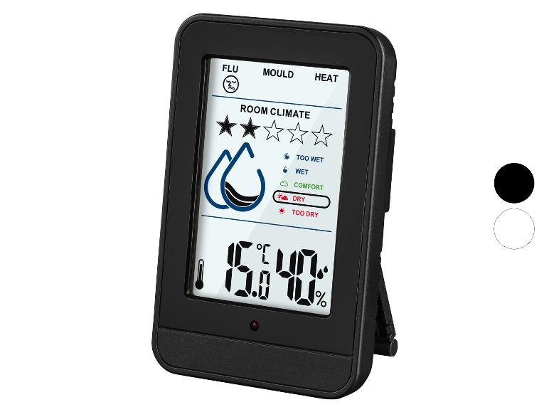 Zwarte digitale thermometer en hygrometer met kamerklimaatweergave.
