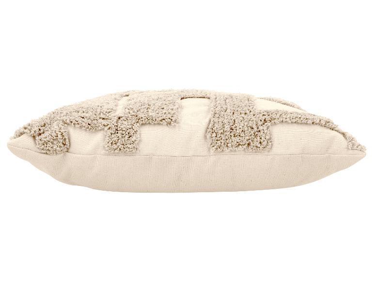 Beige decoratief kussen met een getextureerd, pluizig patroon