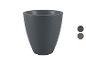 Donkergrijze bloempot met textuur, met kleurstalen in grijs en bruin.