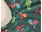 Groene kinder slab met cartoon superhelden en reflecterend materiaal label.