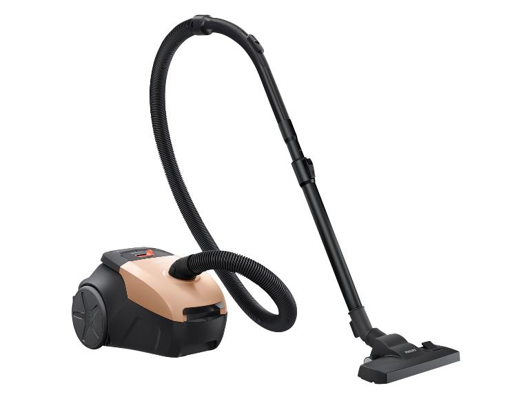 Zwart-beige stofzuiger met flexibele slang en vloermondstuk