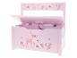 Roze houten speelgoedkist met bosdier- en paddenstoelillustraties, deksel open.