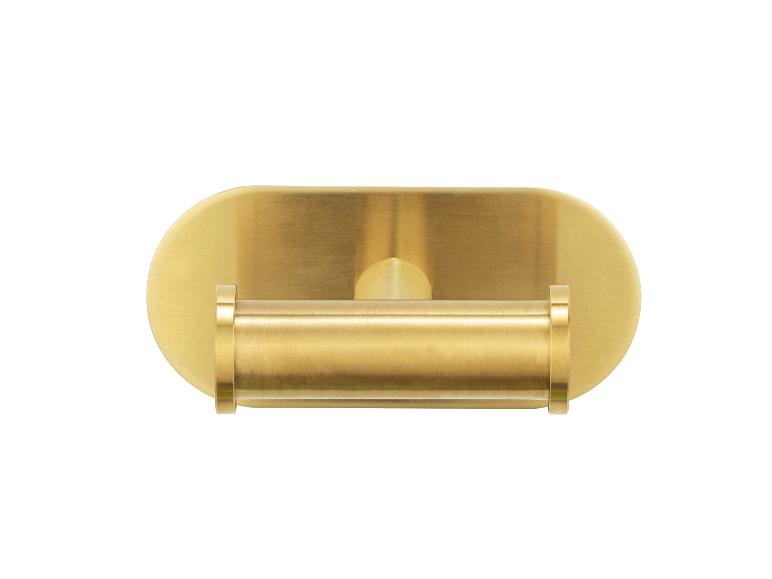 Gouden wandhouder voor handdoeken.