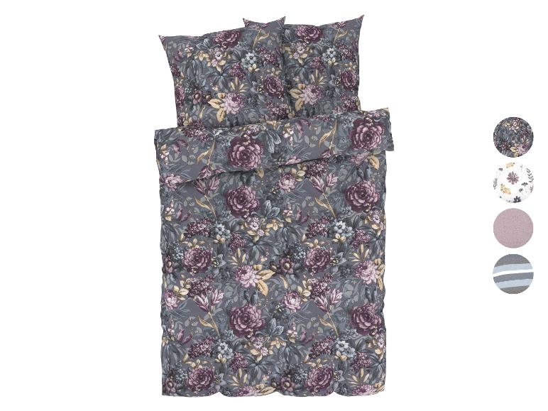 Bloemen beddengoed in grijze tinten.