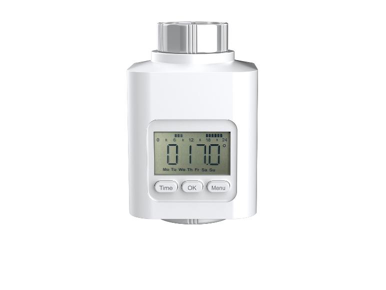 Witte digitale radiatorthermostaat met display en knoppen