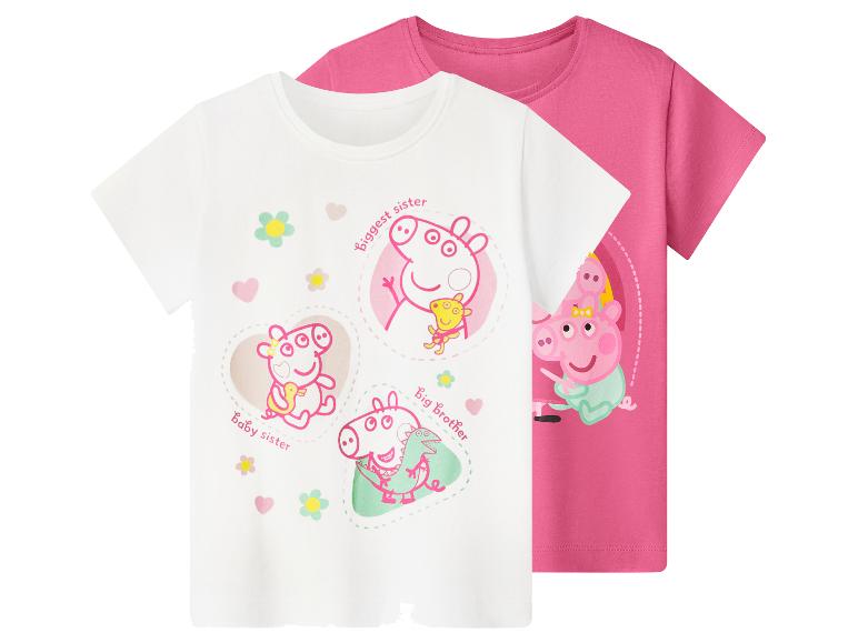 Meisjes T-shirts met korte mouwen, één wit met varkentjesprints en één roze met een varkentje.